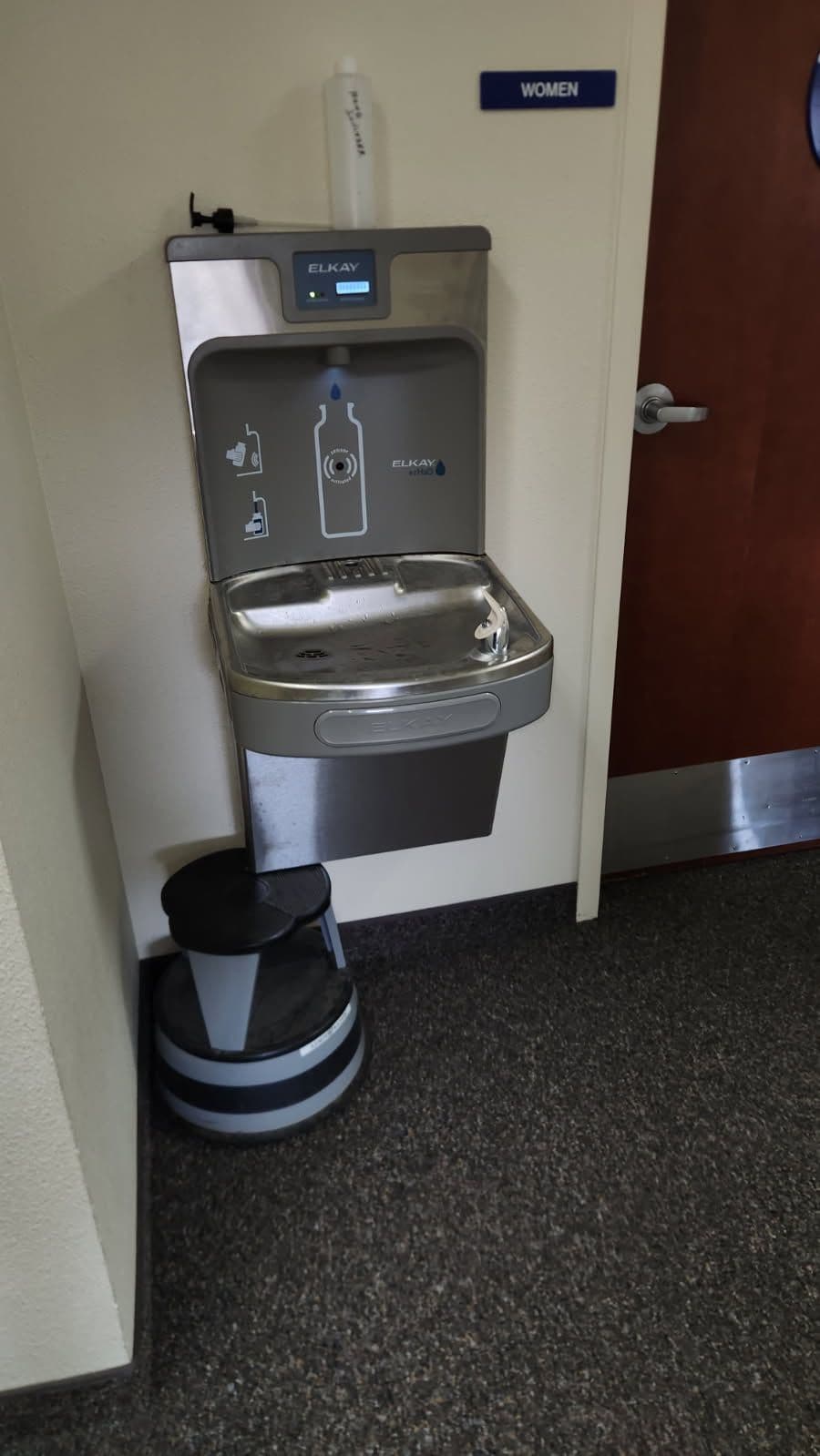 Sleek Drinking Fountain Installed by Restroom image